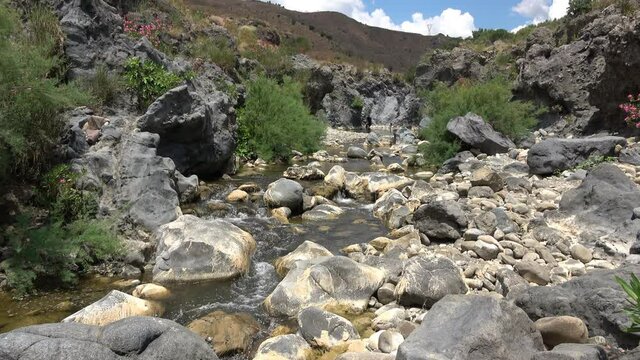 Medieval bridge of Adrano, Sicily, of arabic origin and saracen. Called Simeto river  lava gorges. Video 4k
