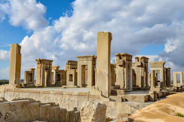 Fototapeta premium Ruined palace of the ancient capital of the Persian empire, Persepolis, a UENSCO world heritage site near the city of Shiraz in Iran