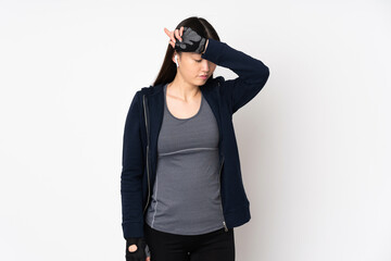 Young sport asian woman isolated on white background with tired expression