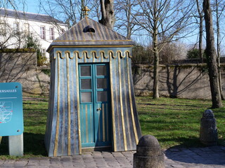 A small wooden gatehouse in the park of Versailles, the 6th march 2021.
