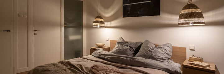 Simple and comfortable bedroom, panorama