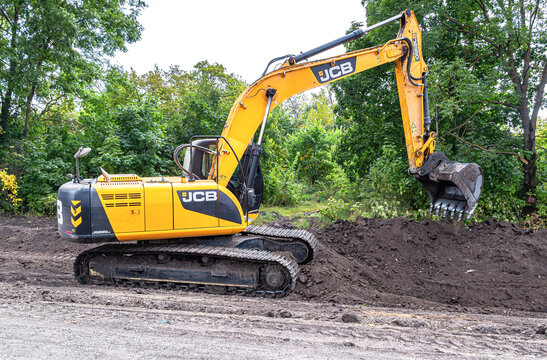 JCB excavator work at the construction of road