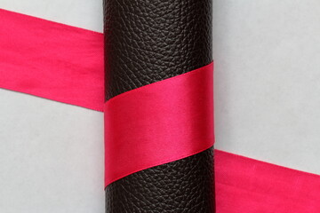 tape around the roll of genuine leather