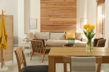 Stylish sofa in living room. Interior design