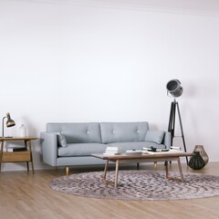 Room with Scandinavian Interior Design with Empty Walls, Sofa, Wooden Floors, Circular Carpet and Middle Table