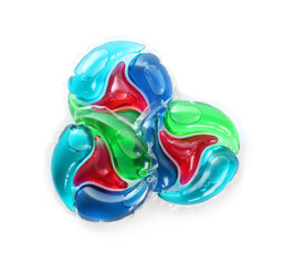 Fototapeta premium Laundry capsules on white background, top view
