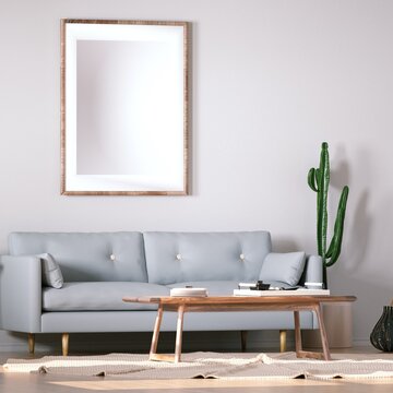 Room with Scandinavian Interior Design with Empty Frame on Walls, Sofa, Wooden Floors, Circular Carpet and Cactus Plant
