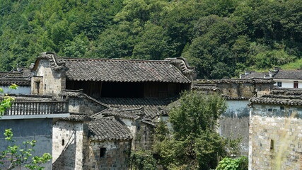 Fototapeta na wymiar The old traditional Chinese architecture located in the countryside of southern China with the black tiles roof and white wall