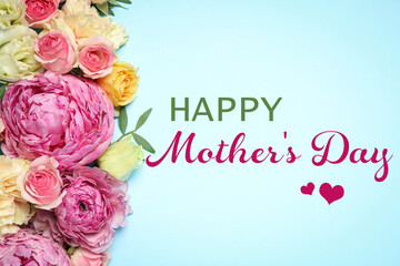 Obraz na płótnie Canvas Happy Mother's Day. Happy Mother's Day. Beautiful flowers on light blue background, flat lay