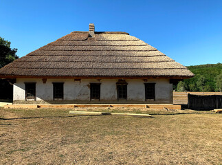 Old buildings of Authentic Cossack farm in Stetsivka village in Сherkasy region, an architectural monument of Ukraine. Cossack wooden church in the village.