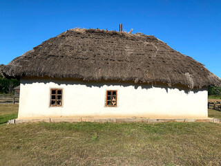 Old buildings of Authentic Cossack farm in Stetsivka village in Сherkasy region, an architectural monument of Ukraine. Cossack wooden church in the village.
