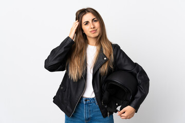 Young Woman holding a motorcycle helmet over isolated white background unhappy and frustrated with something. Negative facial expression