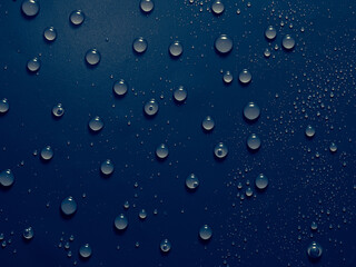 Water drops on blue background.
