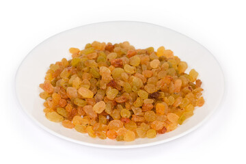 Golden yellow raisins on dish on white background, selective focus