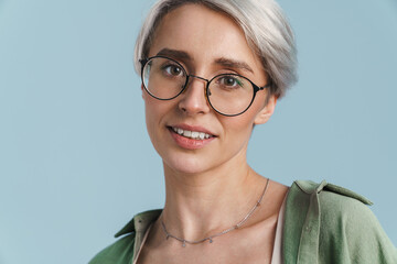 Pleased beautiful silver girl posing in eyeglasses on camera