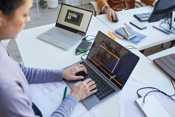Female IT Programmer Using Laptop