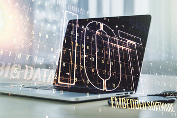 Double exposure of creative IOT hologram on laptop background, research and development concept