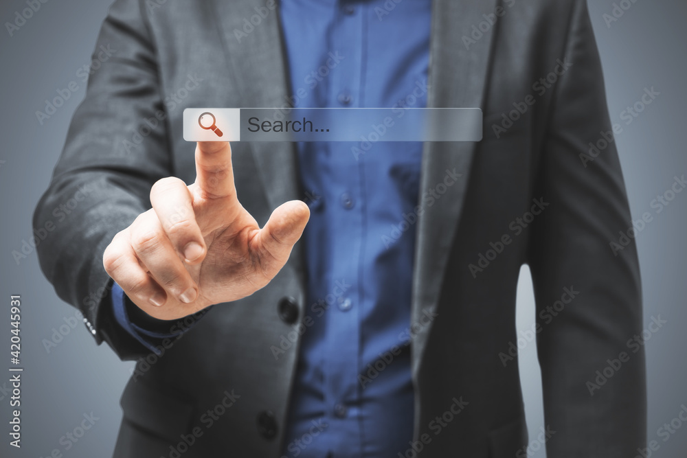 Poster online searching concept with man in blue shirt pushes digital button on touch screen with search bo