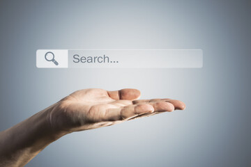 Searching browsing internet data information concept with man palm and loupe above