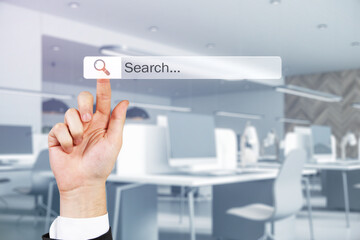 Internet browser search bar on touch screen and man hand clicking on loupe icon