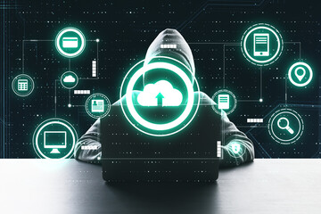 Data and cloud service security concept with hacker silhouette with laptop and virtual screen with internet storage icons