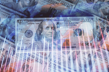Fototapeta premium Multi exposure of forex chart drawing over us dollars bill background. Concept of financial success markets.