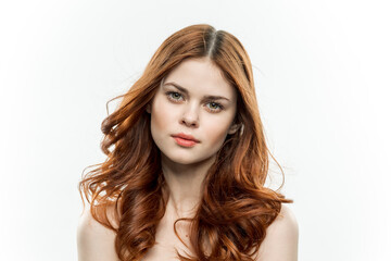 Fototapeta premium cheerful woman attractive look naked shoulders loose hair light background