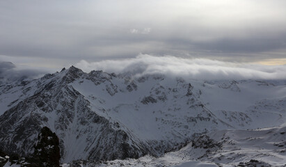 Highest mountain range of the Greater Caucasus beautiful cloudy landscape
