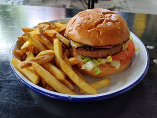 Vegan burger with fries