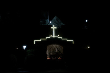 Illuminated holy cross at night 28.2.2021