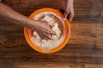 Making bread on a wooden board