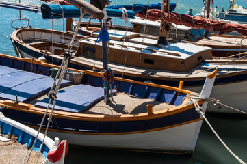 Fototapeta na wymiar Fishing boats tied to pier at Aix en Provence, France