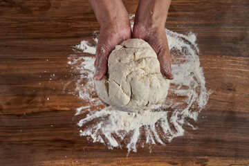 Woman kneading dough