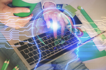 Double exposure of woman hands working on computer and brain hologram drawing. Ai concept.