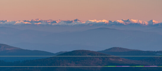 Tatra mountains from Lysa hora hill in Moravskoslezske Beskydy mountains in Czech republic during sunset