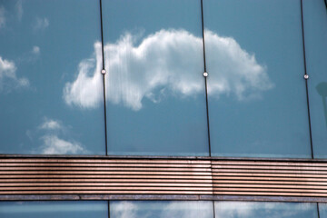 Cloud reflected on a crystal facade
