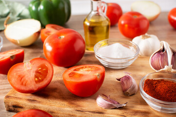 Preparing tomato sauce in the kitchen. Ingredients on the kitchen counter	