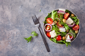 tomato salad with brie cheese olives onion lettuce