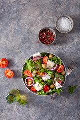 tomato salad with brie cheese olives onion lettuce