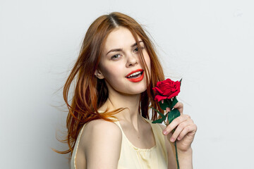 smiling woman holding rose flower in hands charm red lips attractive look 