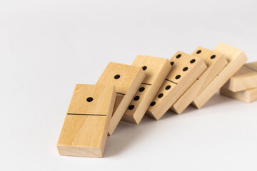 A game of dominoes on a light background. Close-up. Selective focus.