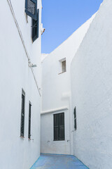 Fototapeta na wymiar White architecture of Fornells village in Minorca Island, Spain.