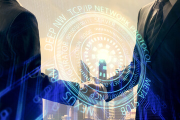 Double exposure of data theme hologram and handshake of two men. Partnership in IT industry concept.