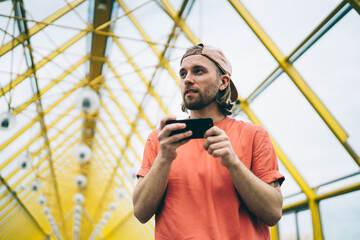 Man surfing smartphone in tunnel