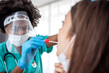 Doctor Taking Mouth Fluid Swab Sample From Throat. Close-up of woman having PCR testing at the...