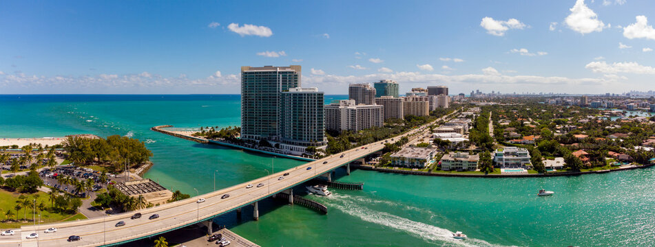 Aerial panorama Miami Beach Haulover Bal Harbour inlet bridge over water