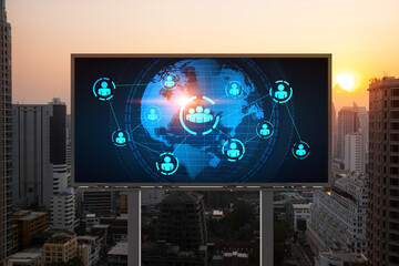 World planet Earth map hologram of social media icons over sunset panoramic cityscape of Bangkok, Southeast Asia. The concept of people connections.