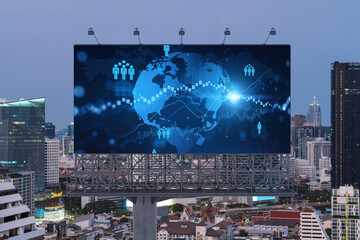 World planet Earth map hologram of social media icons over sunset panoramic cityscape of Bangkok, Southeast Asia. The concept of people connections.