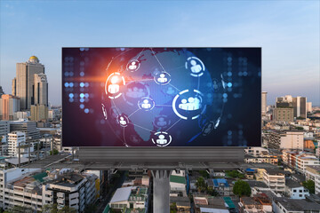 World planet Earth map hologram of social media icons over sunset panoramic cityscape of Bangkok, Southeast Asia. The concept of people connections.