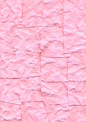 crumpled pink paper pieces background 